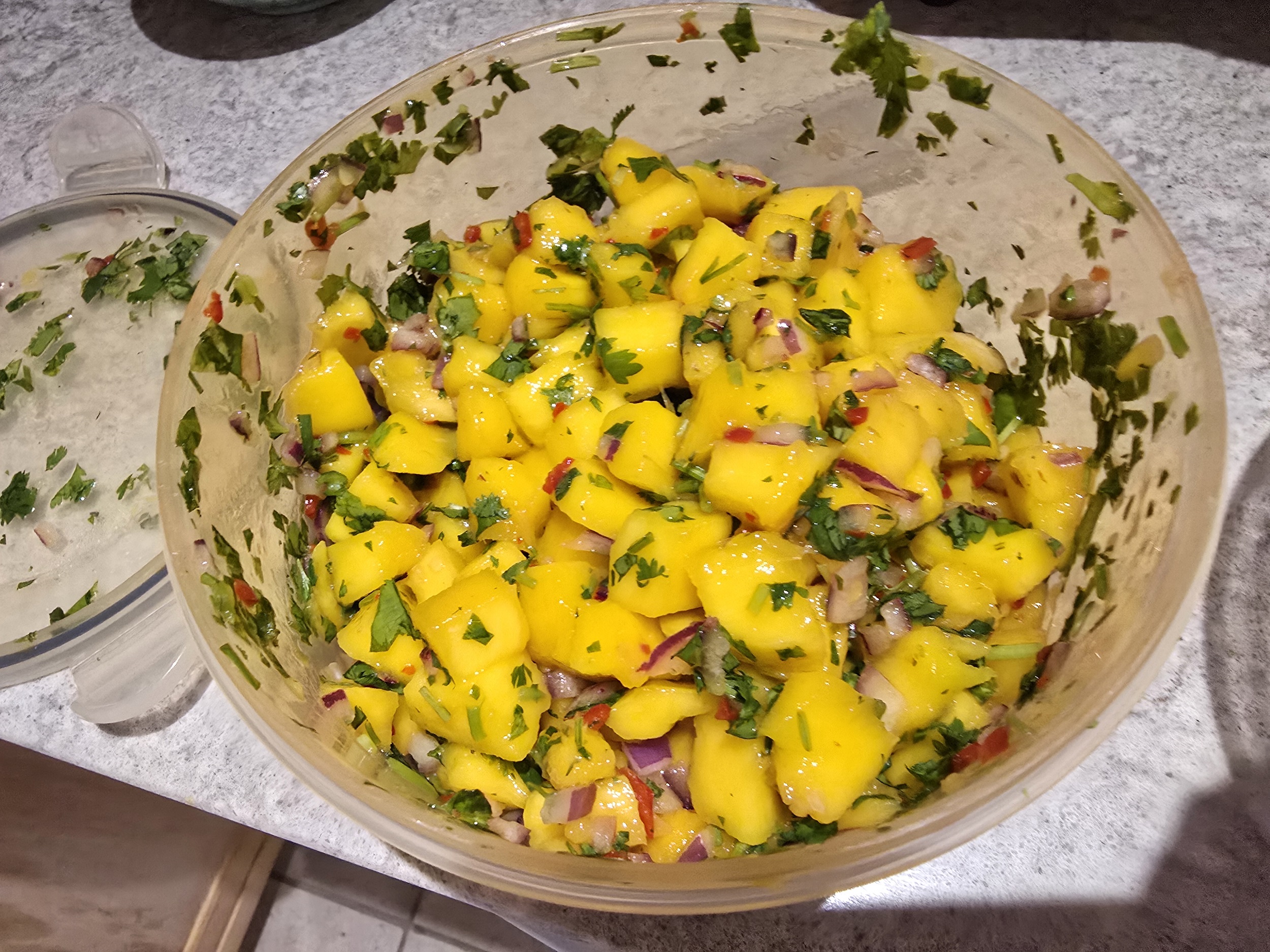 Fresh mango and red jalapeño salsa in a bowl